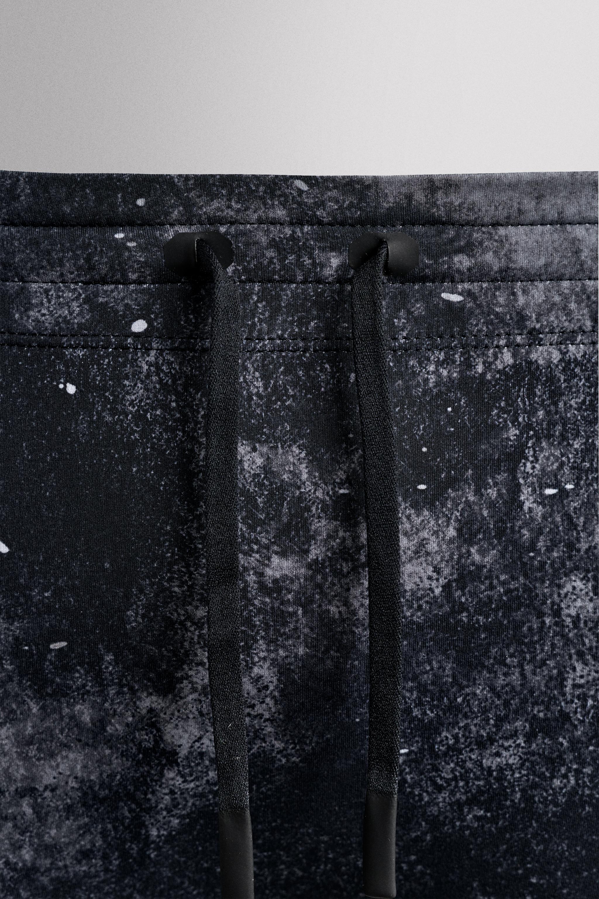 LEGGINGS DE RUNNING À IMPRIMÉ ABSTRAIT